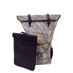 Forest Camo Dry Pocket backpack with a separate black pouch displayed in front.