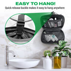 Open black toiletry bag hanging above a sink, with a close-up of its quick-release hanging buckle.
