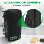 Black toiletry bag under running water, with a close-up of the zipper and water droplets.