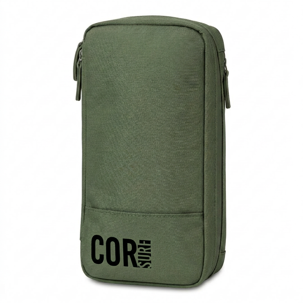 Front view of the dark green COR Surf toiletry bag with its carrying handle and side zipper.